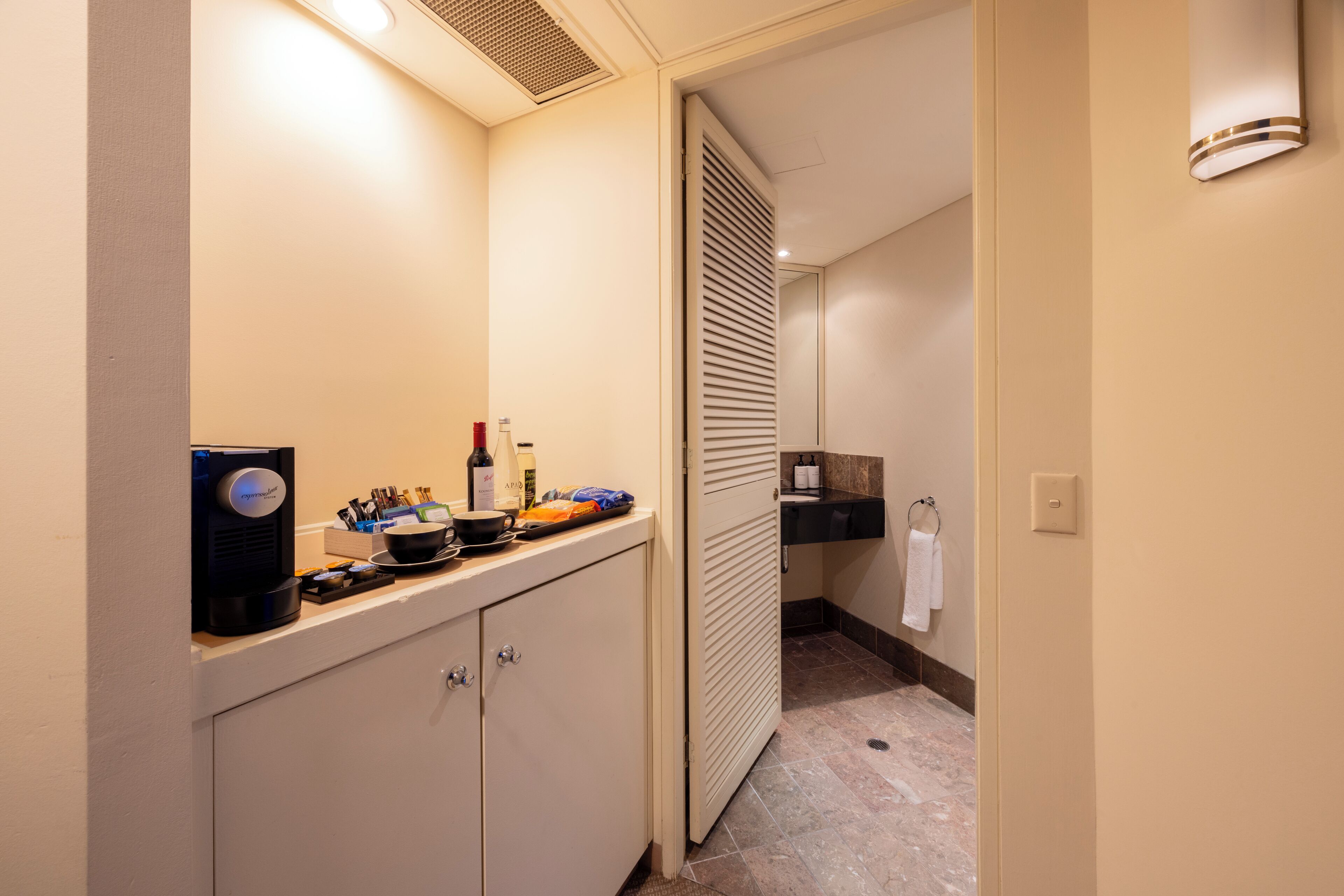 junior suite, 1 king bed, city view | premium bedding, minibar, in-room safe, desk