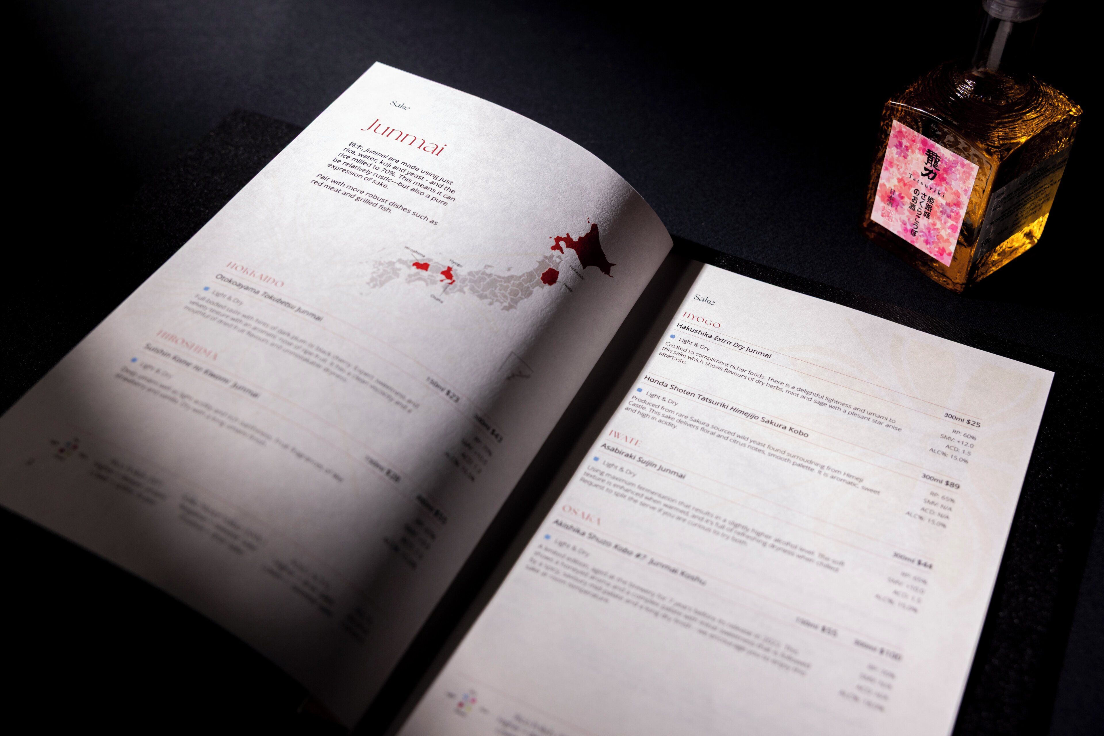 An open menu with various food items and prices listed.