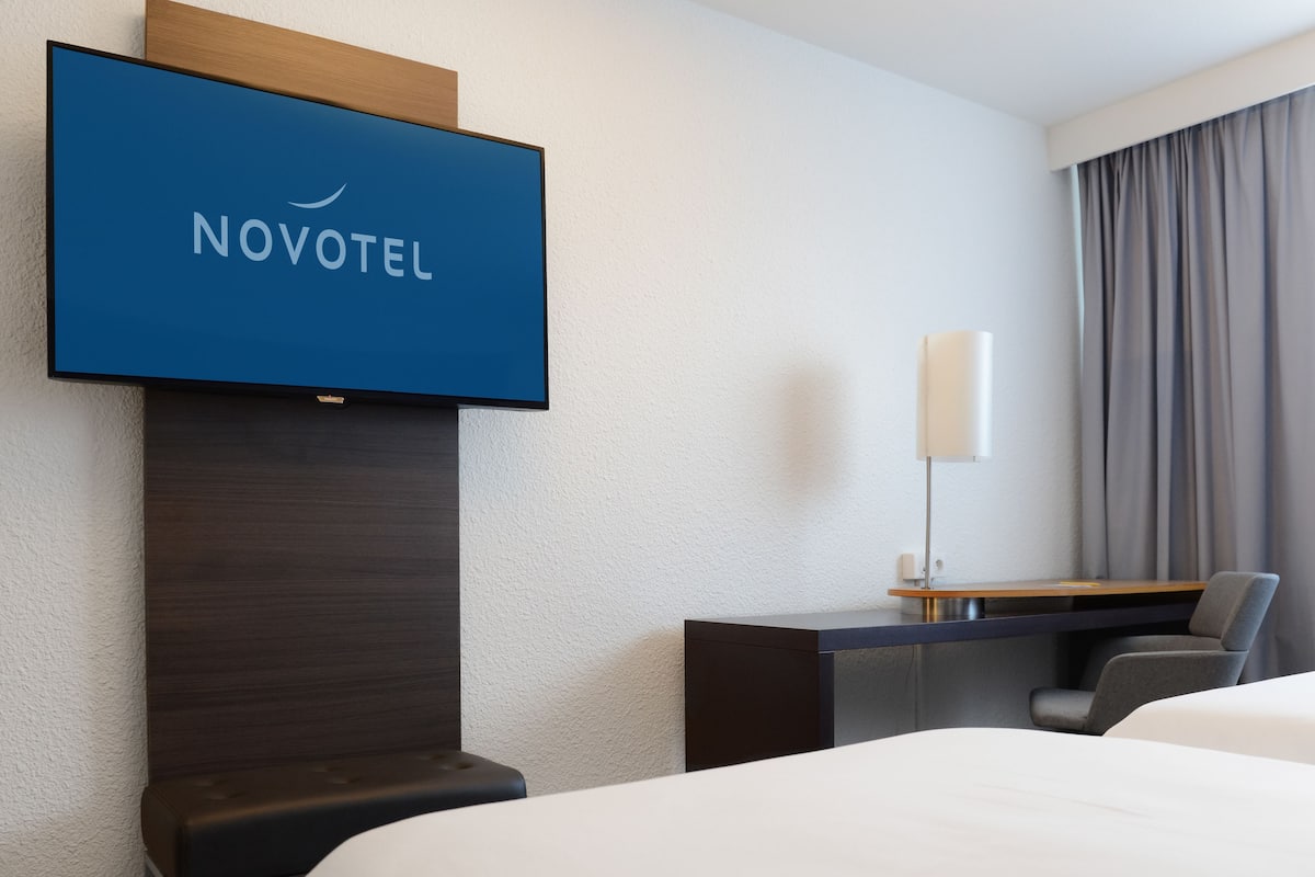 desk, blackout curtains, soundproofing, iron/ironing board