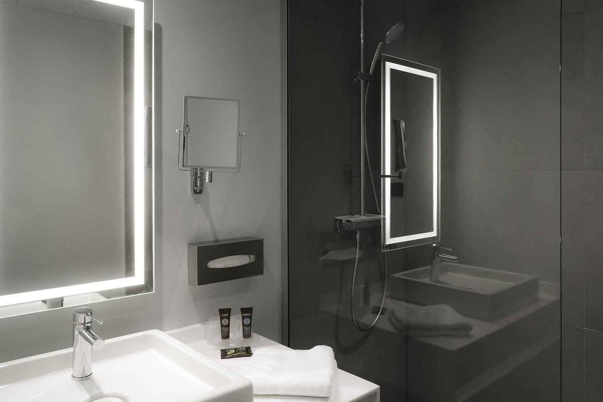 Desk, blackout curtains, soundproofing, iron/ironing board