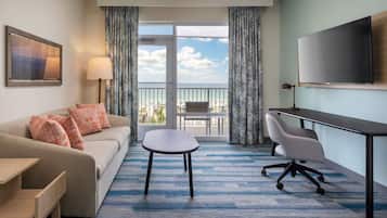 Suite, 1 kingsize-seng med sovesofa, ved strandkanten | Oppholdsområde | LCD-TV