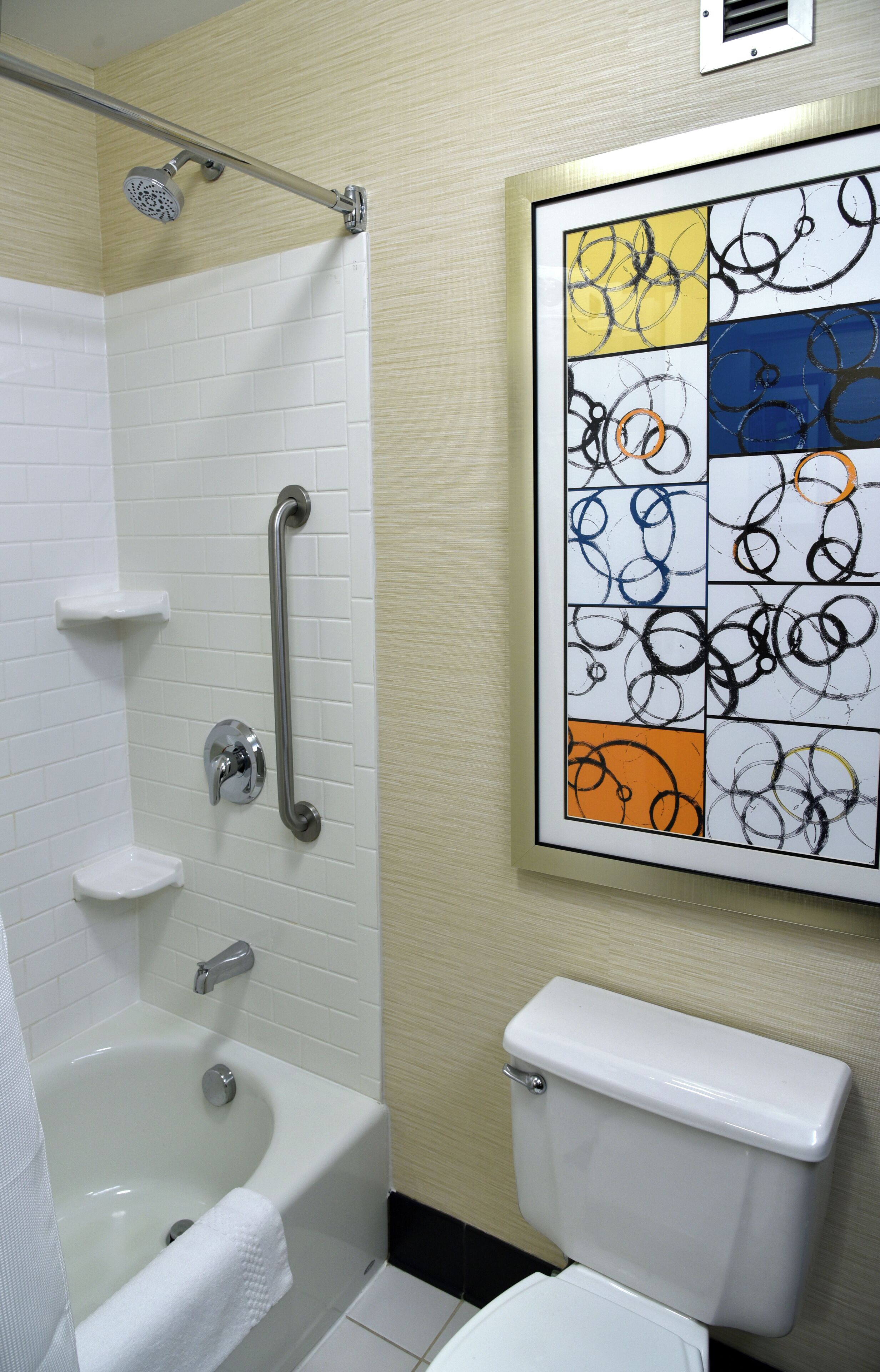 combined shower/bathtub, free toiletries, hair dryer, towels