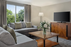 Presidential Suite, 1 Bedroom, Non Smoking | Living room | 49-inch Smart TV with satellite channels, TV