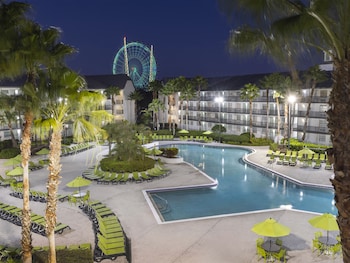 Outdoor pool, open 7:00 AM to 11:00 PM, pool umbrellas, sun loungers at Avanti International Resort