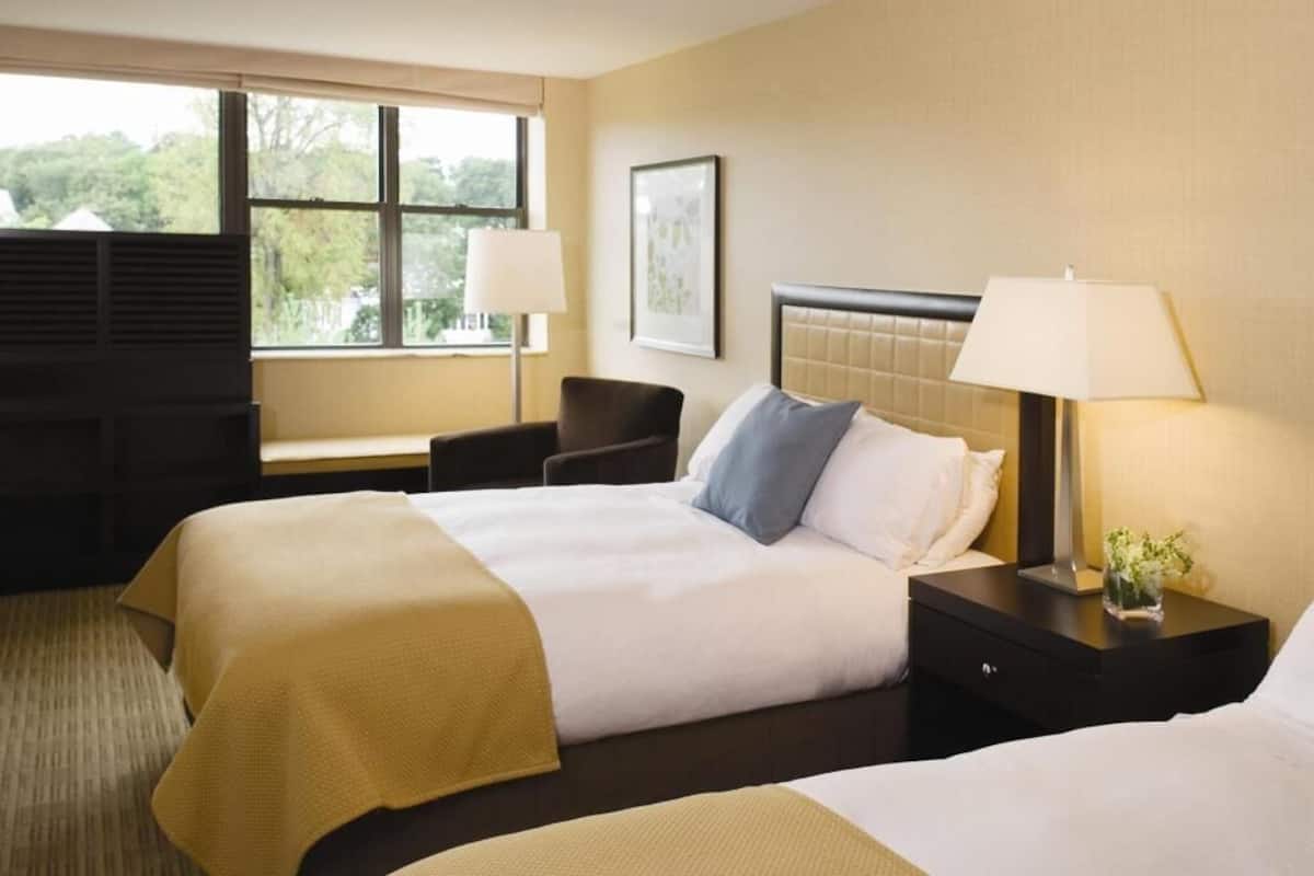 Premium bedding, down comforters, pillowtop beds, in-room safe