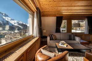 Panoramic Suite, 2 Bedrooms | Living area | Flat-screen TV