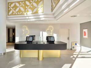 Check-in/check-out kiosk