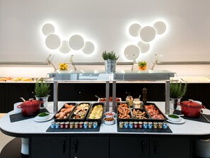 Daily buffet breakfast (EUR 27 per person)