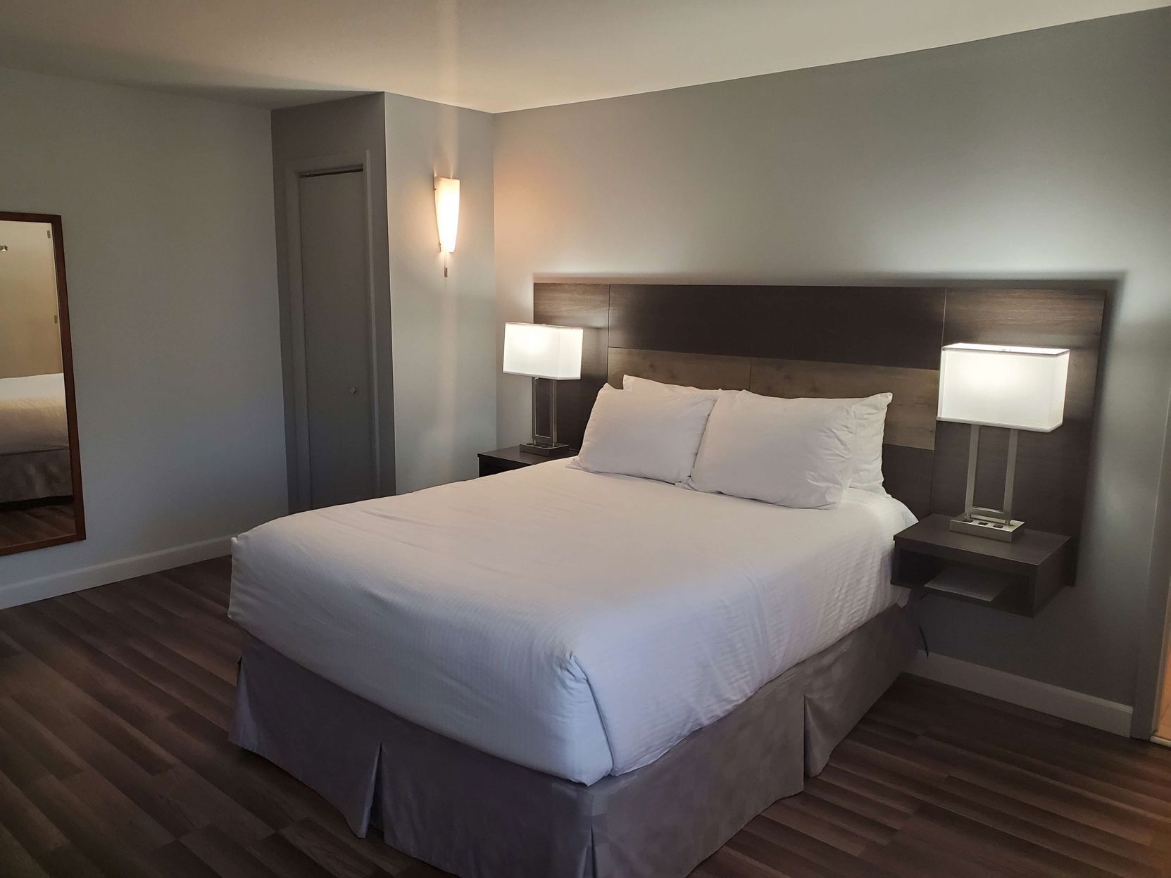 Pillow-top beds, laptop workspace, blackout curtains, iron/ironing board