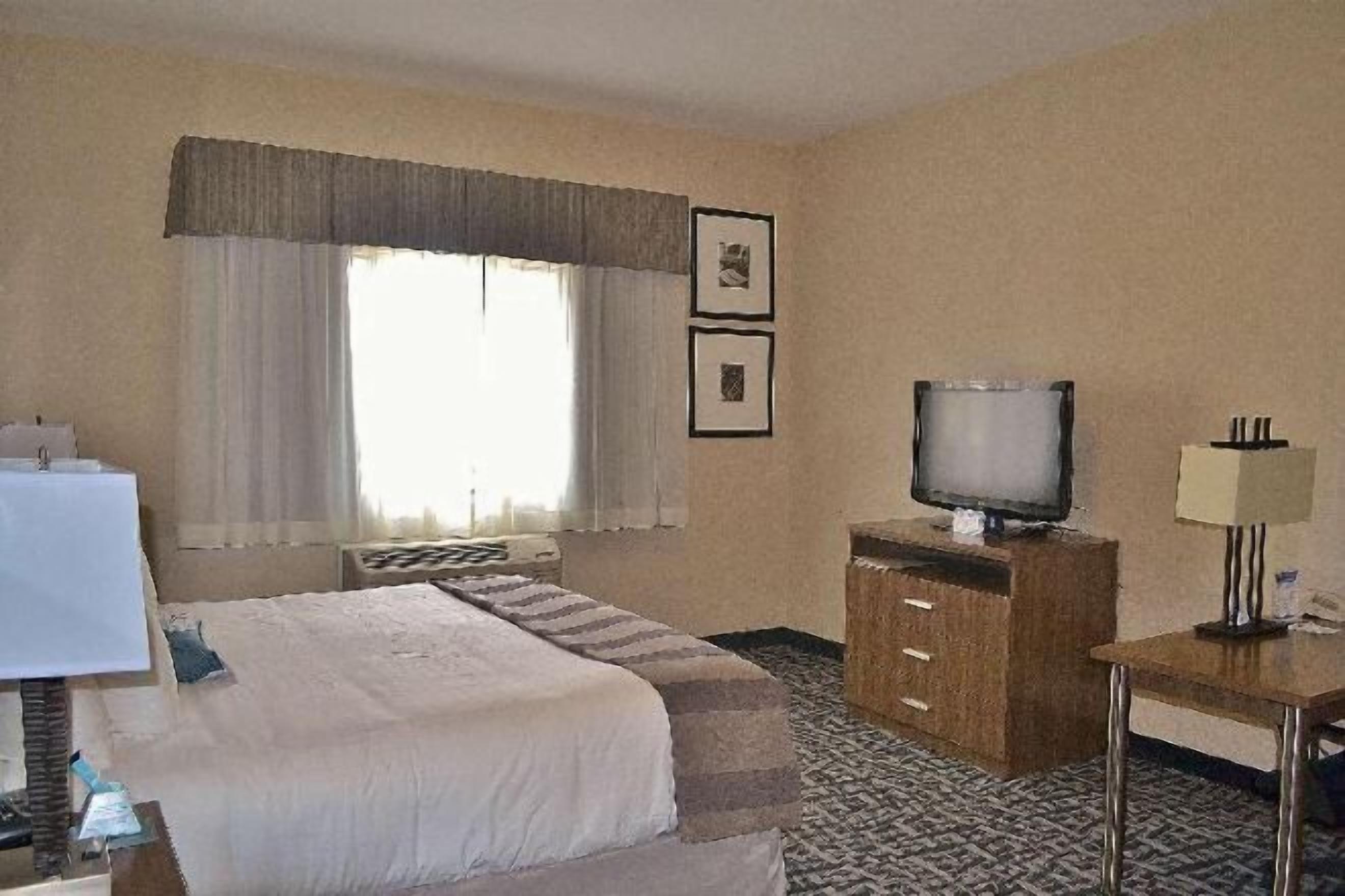 Pillowtop beds, laptop workspace, blackout drapes, iron/ironing board