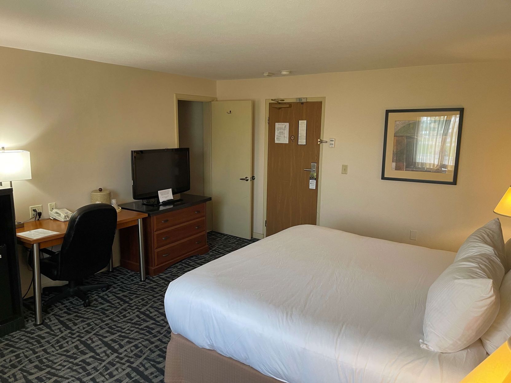 Pillow-top beds, laptop workspace, blackout curtains, iron/ironing board