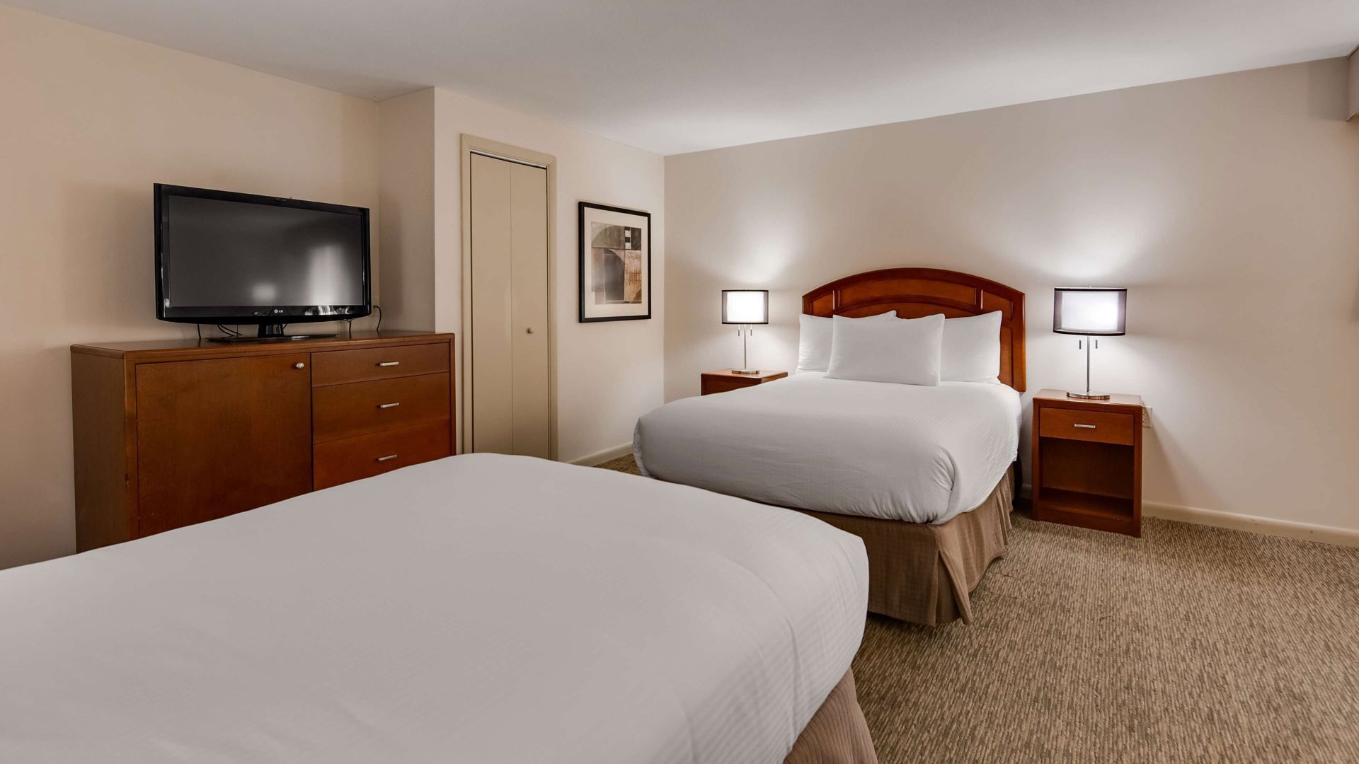 Pillow-top beds, laptop workspace, blackout curtains, iron/ironing board