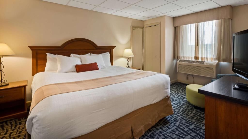 Pillow-top beds, laptop workspace, blackout curtains, iron/ironing board