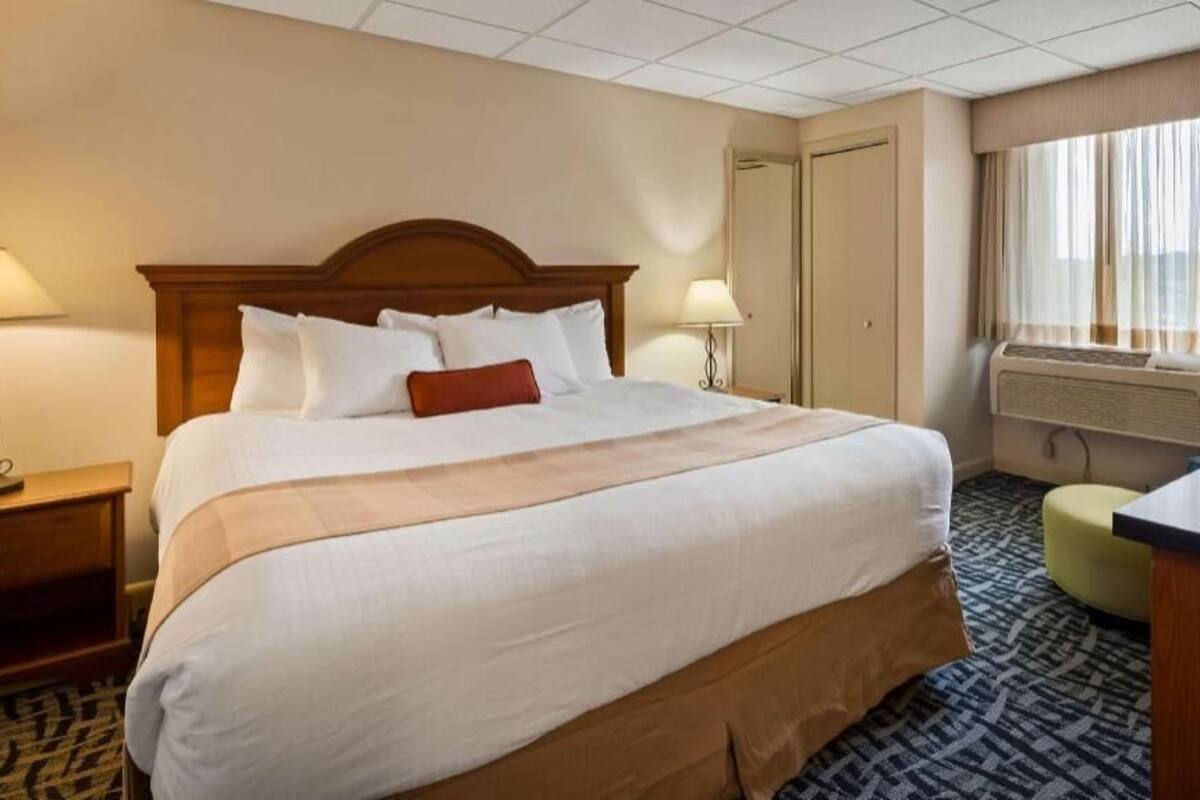 Pillow-top beds, laptop workspace, blackout curtains, iron/ironing board