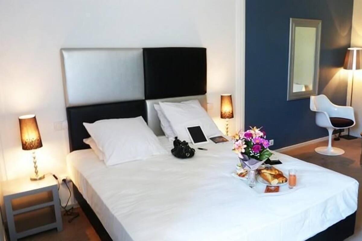 Desk, soundproofing, iron/ironing board, free cribs/infant beds