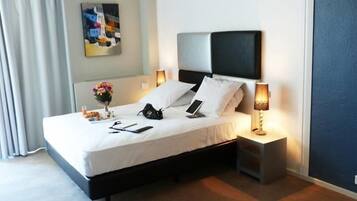 Desk, soundproofing, iron/ironing board, free cribs/infant beds