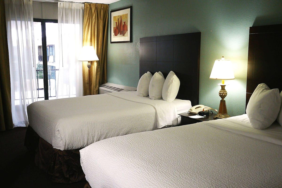 Hypo-allergenic bedding available, desk, laptop workspace