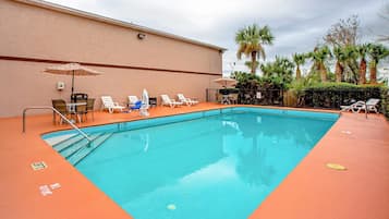 Outdoor pool, pool umbrellas, pool loungers