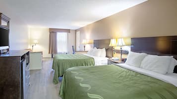 Desk, blackout drapes, iron/ironing board, rollaway beds