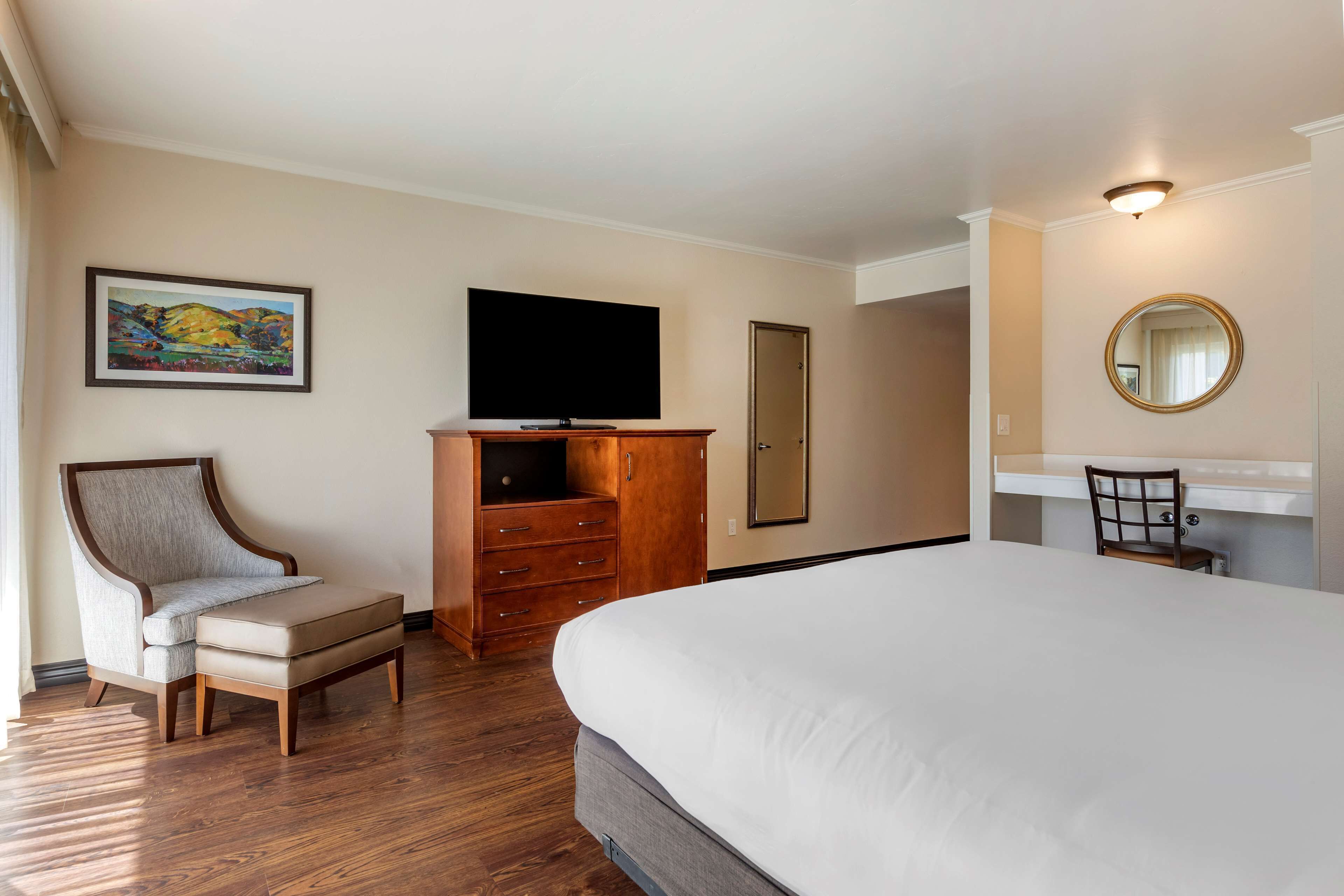 in-room safe, desk, blackout curtains, iron/ironing board