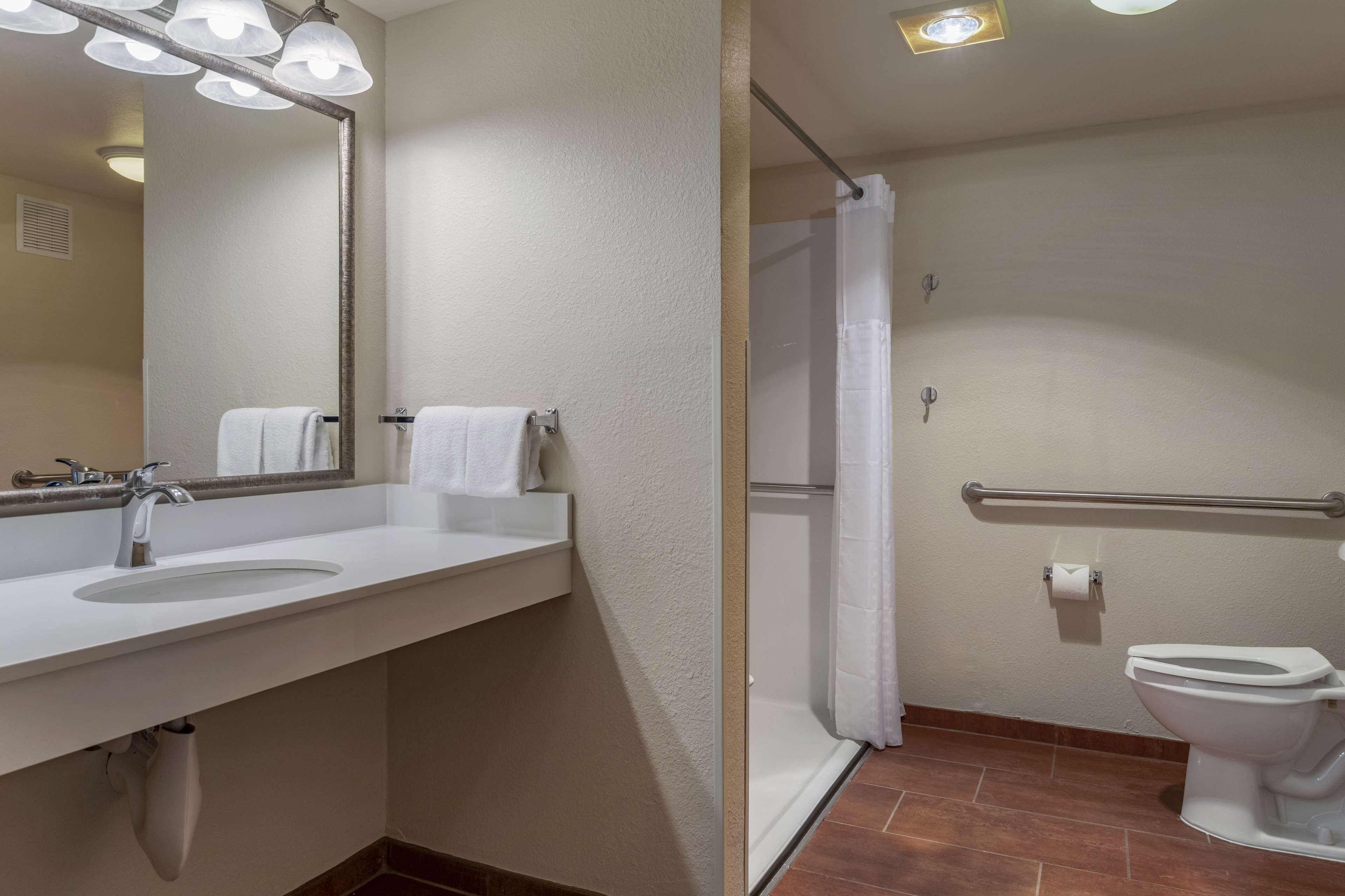 combined shower/bathtub, free toiletries, hair dryer, towels