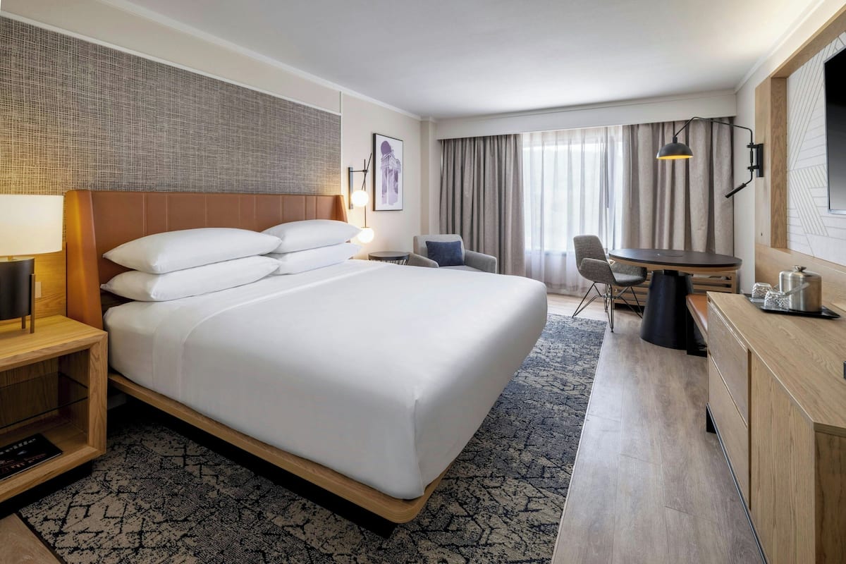 room, 1 king bed | premium bedding, in-room safe, desk, blackout curtains