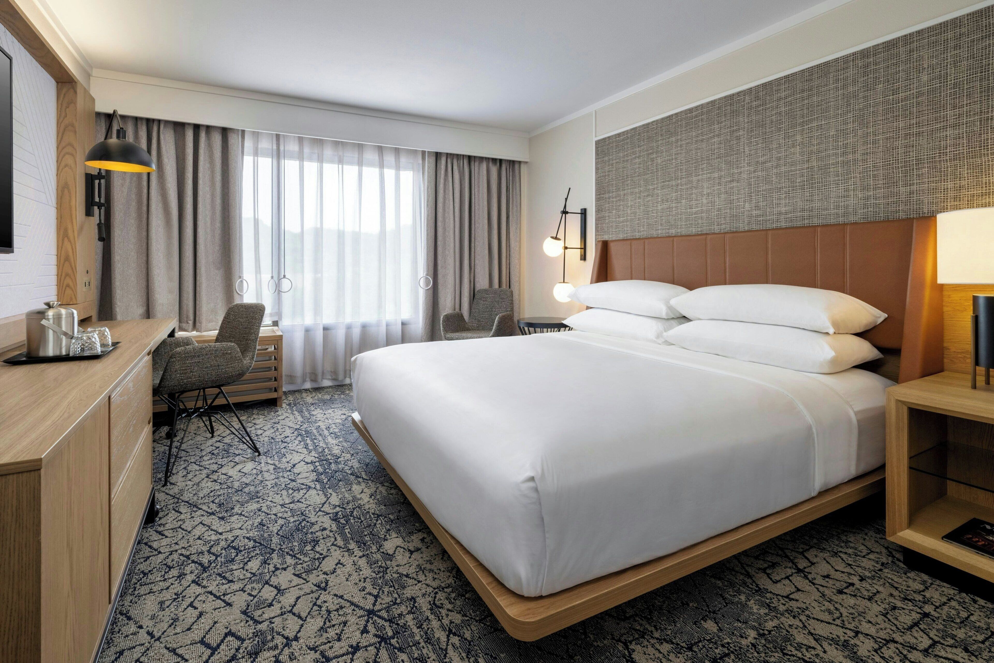 room, 1 king bed | premium bedding, in-room safe, desk, blackout curtains