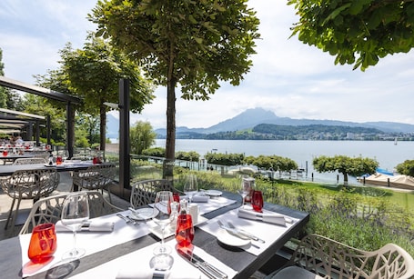 Terrace/patio. HERMITAGE Lake Lucerne - Beach Club & Lifestyle Hotel