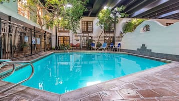 Indoor pool, open 10:00 AM to 8:00 PM, pool loungers