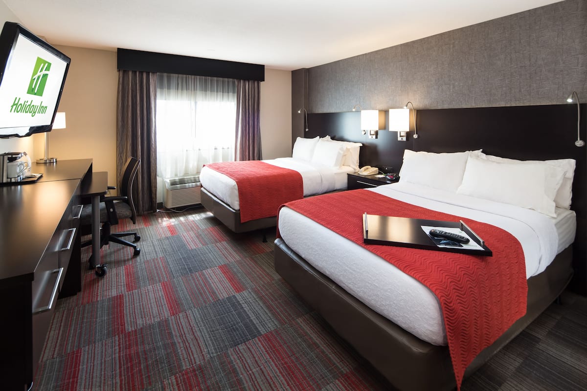 Premium bedding, down duvets, pillow-top beds, in-room safe