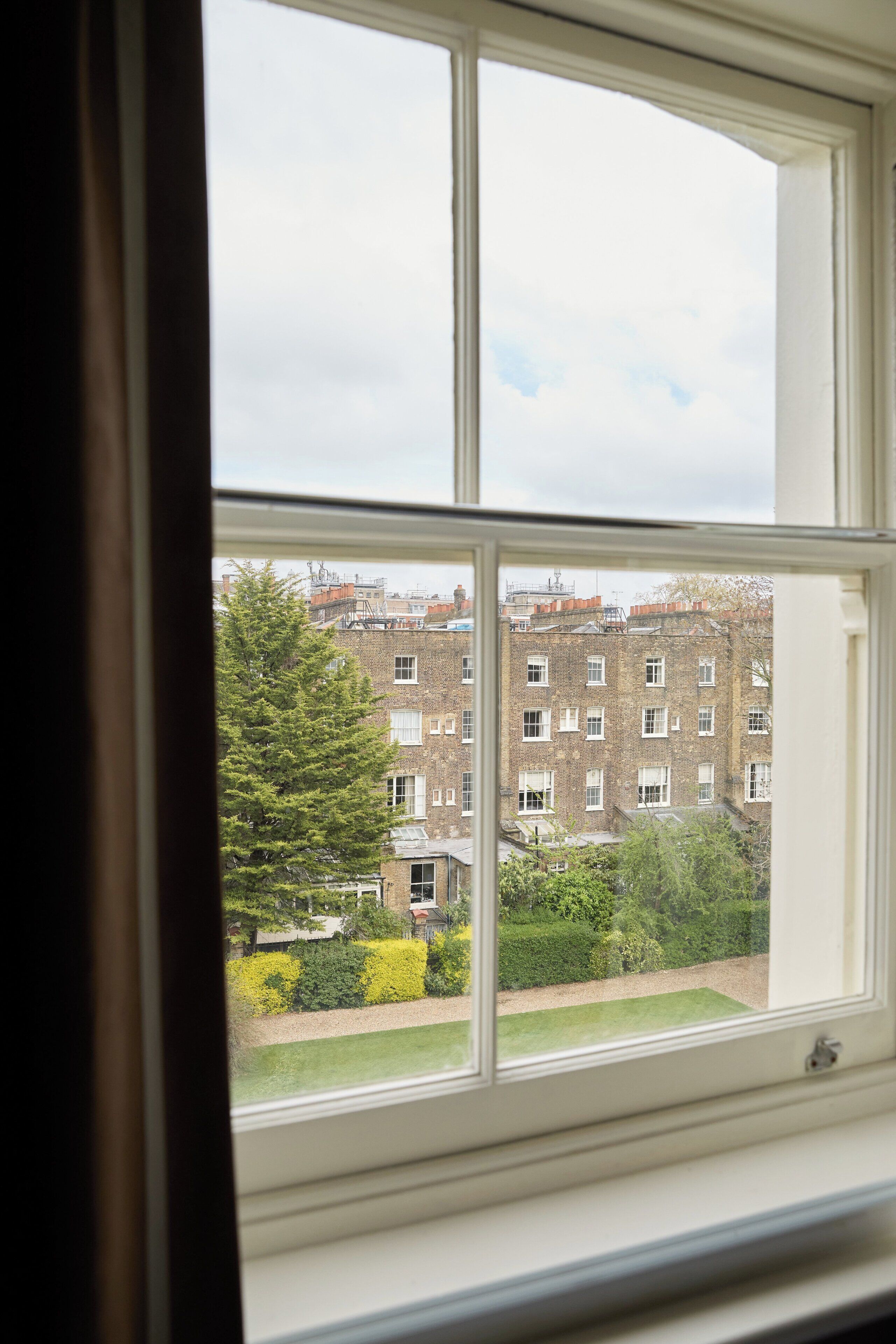 garden view king | premium bedding, in-room safe, individually decorated