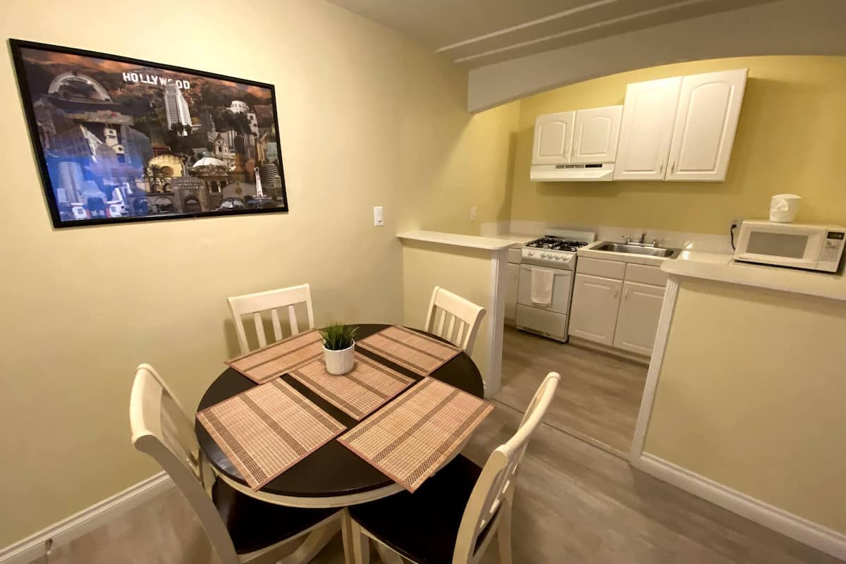 deluxe two king | blackout curtains, iron/ironing board, free cots/infant beds