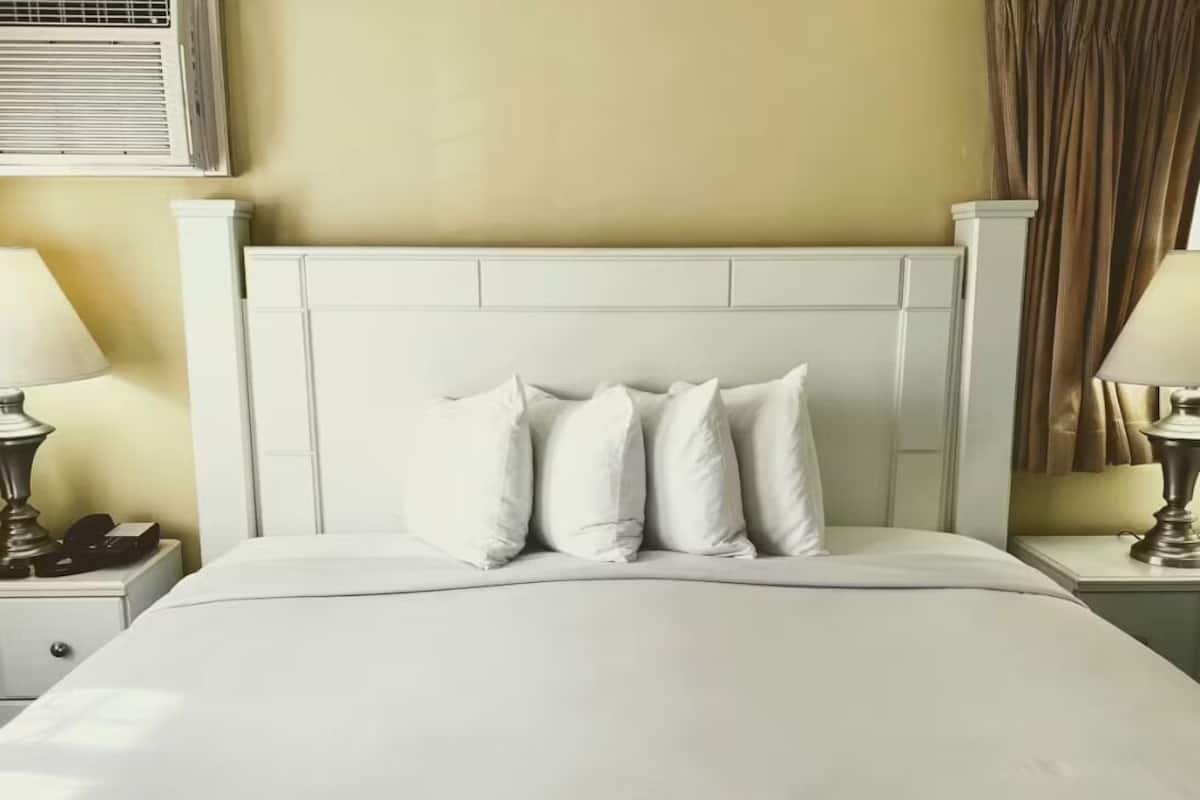 Blackout curtains, iron/ironing board, free cots/infant beds
