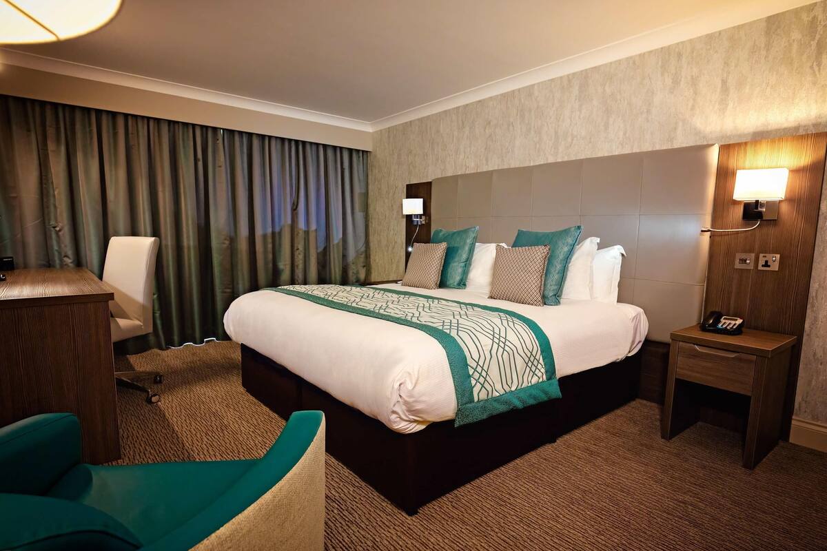 Premium bedding, down duvets, pillow-top beds, in-room safe