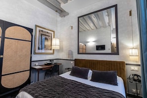 Superior Double Room | Minibar, in-room safe, individually decorated, individually furnished