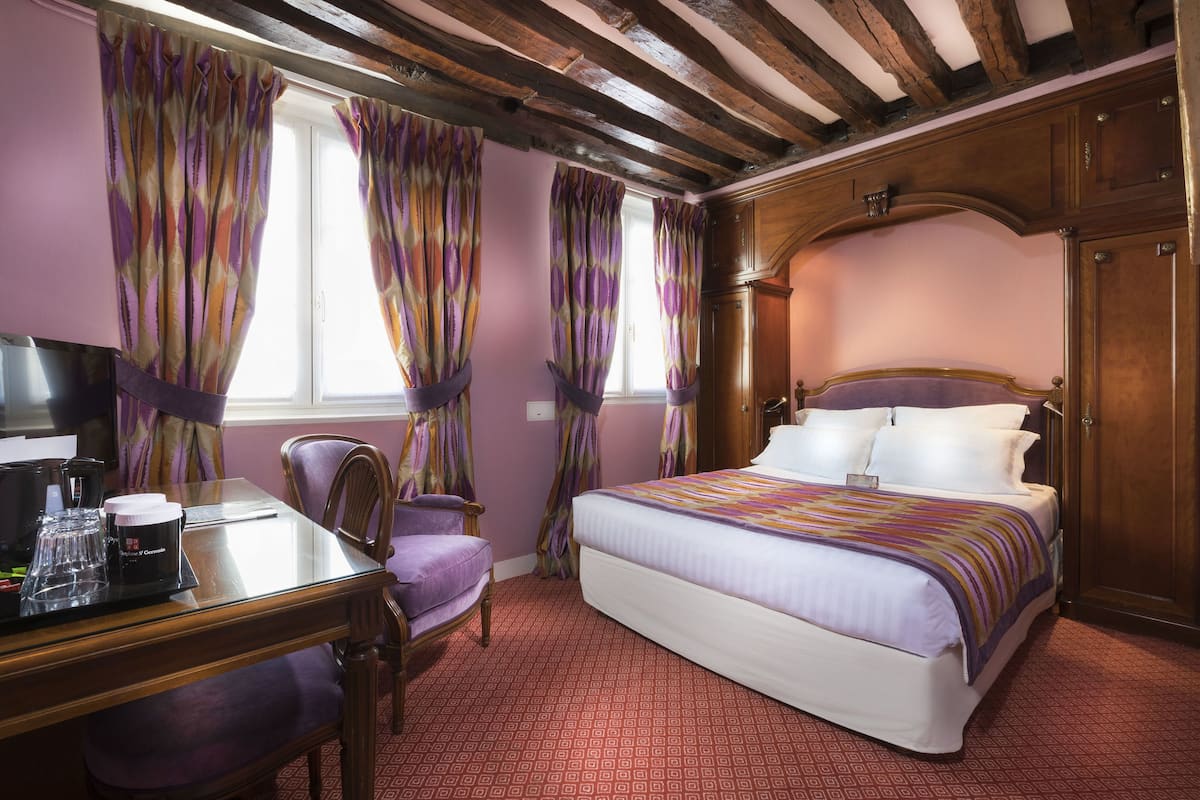 Superior Double Room | Minibar, in-room safe, individually decorated, individually furnished