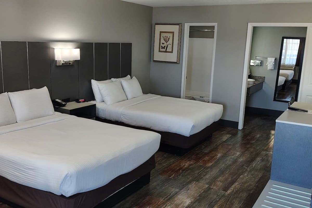 Standard Room, 2 Queen Beds, Non Smoking, Refrigerator & Microwave | 1 bedroom, desk, soundproofing, iron/ironing board