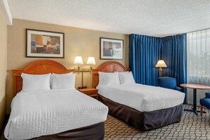 Premium bedding, blackout curtains, iron/ironing board, rollaway beds