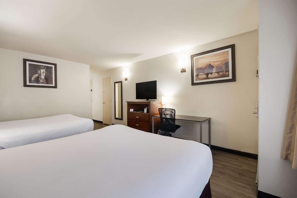 Pillowtop beds, desk, laptop workspace, blackout drapes