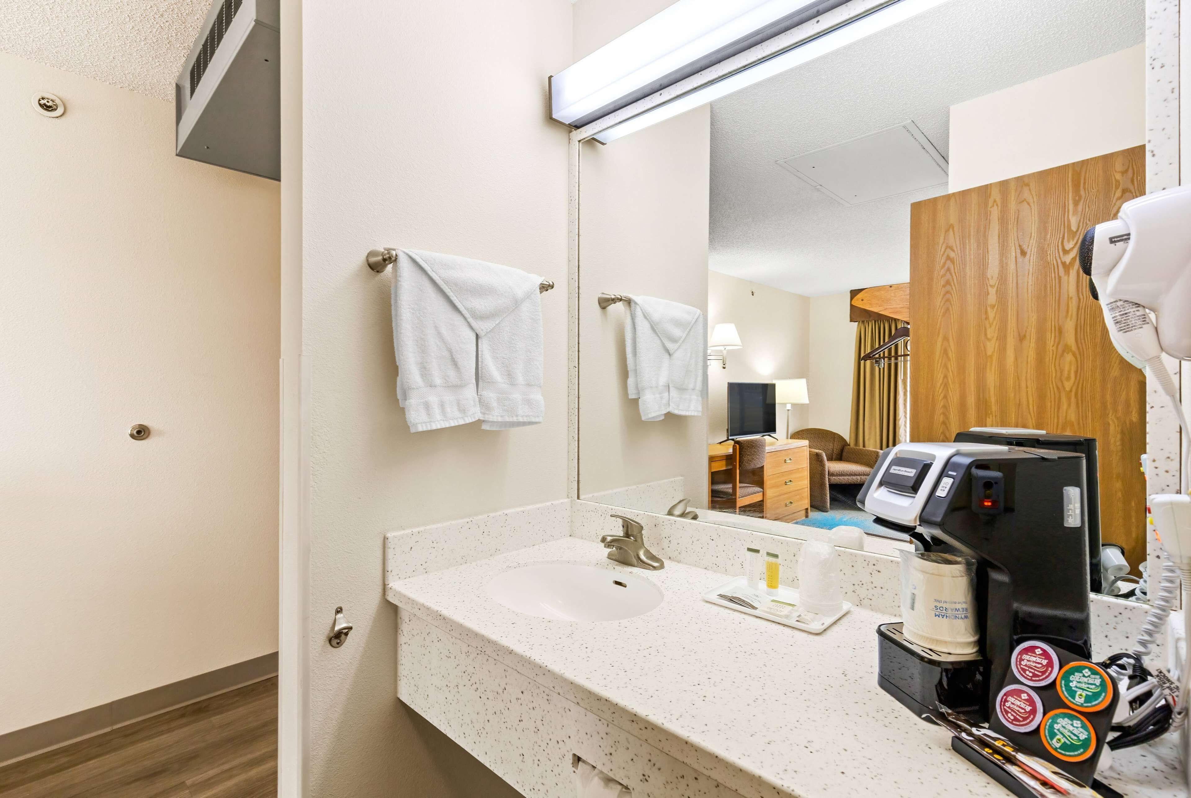 combined shower/bathtub, free toiletries, hair dryer, towels