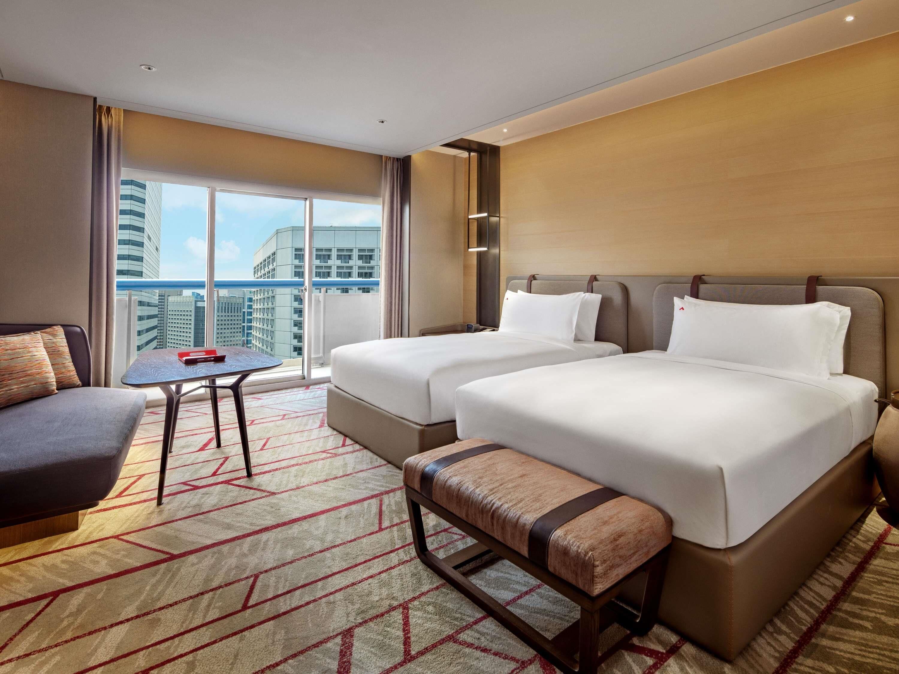 Premier Room, 2 Doubles, Balcony, City View | In-room safe, desk, laptop workspace, blackout drapes