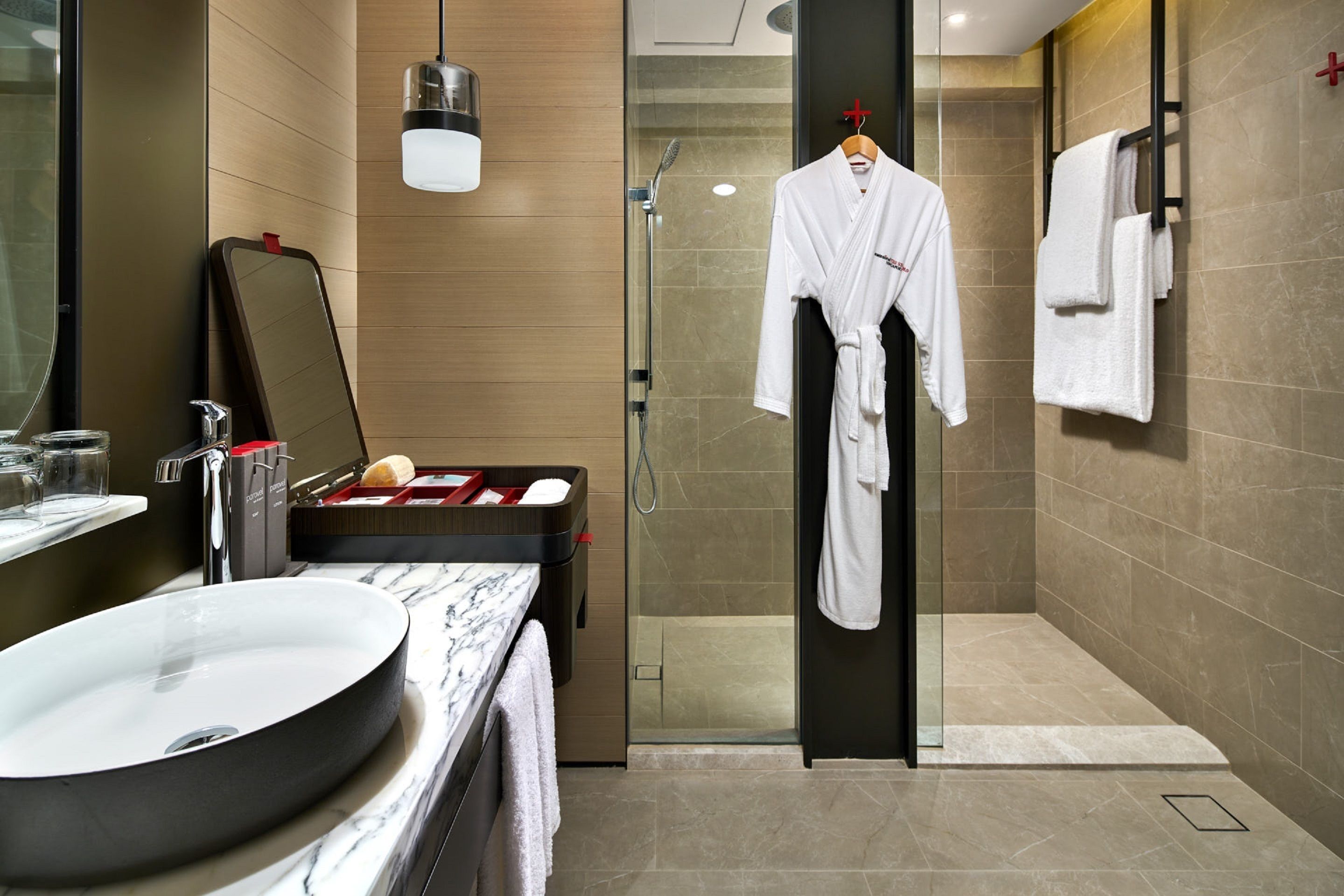 eco-friendly toiletries, hair dryer, bathrobes, slippers