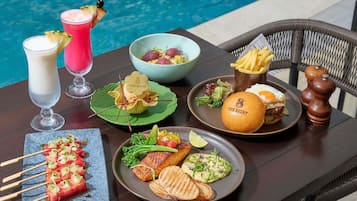 2 outdoor pools, open 7:00 AM to 9:00 PM, pool umbrellas, sun loungers