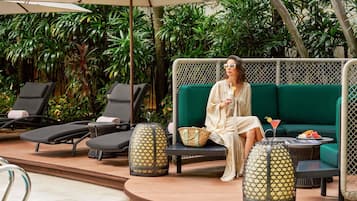 2 outdoor pools, open 7:00 AM to 9:00 PM, pool umbrellas, sun loungers
