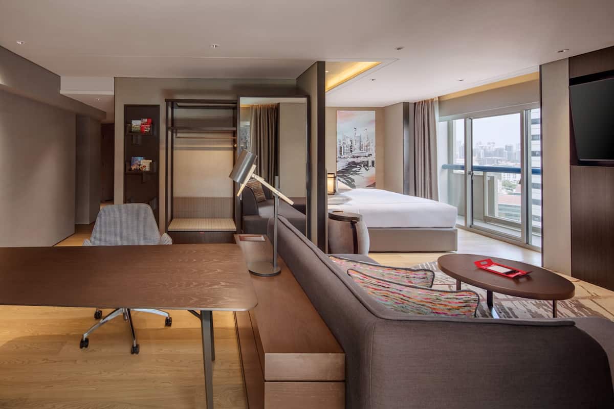 signature suite, 1 king, 2 balconies, city view | 1 bedroom, in-room safe, desk, laptop workspace