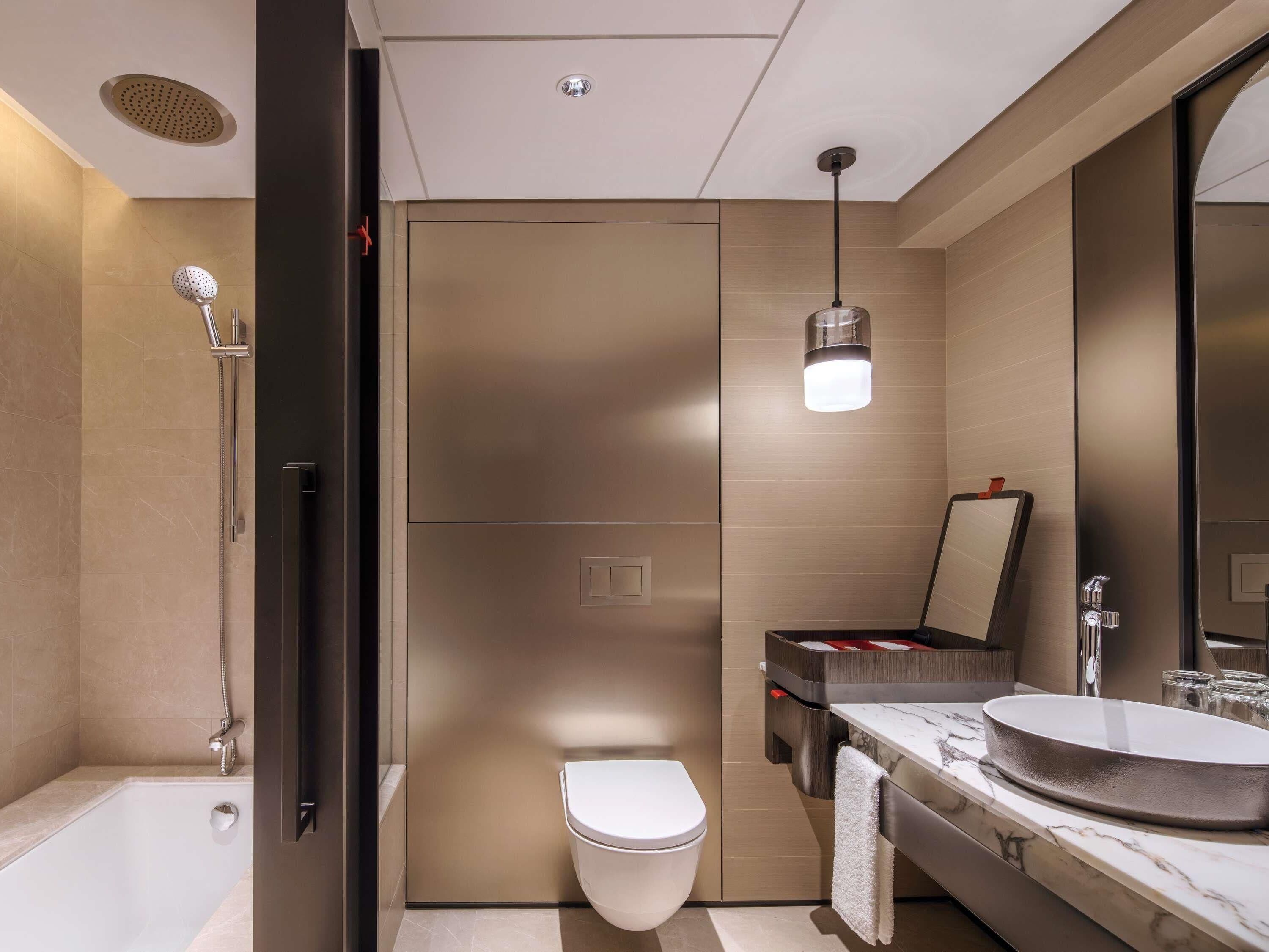 Eco-friendly toiletries, hair dryer, bathrobes, slippers