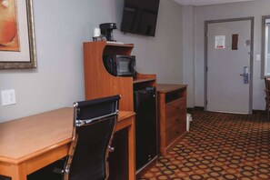 Premium bedding, pillowtop beds, laptop workspace, blackout drapes