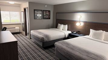 Luxe beddengoed, pillowtop-bedden, een laptopwerkplek