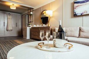 Suite, 1 Bedroom | Living area | 55-inch flat-screen TV with cable channels, TV