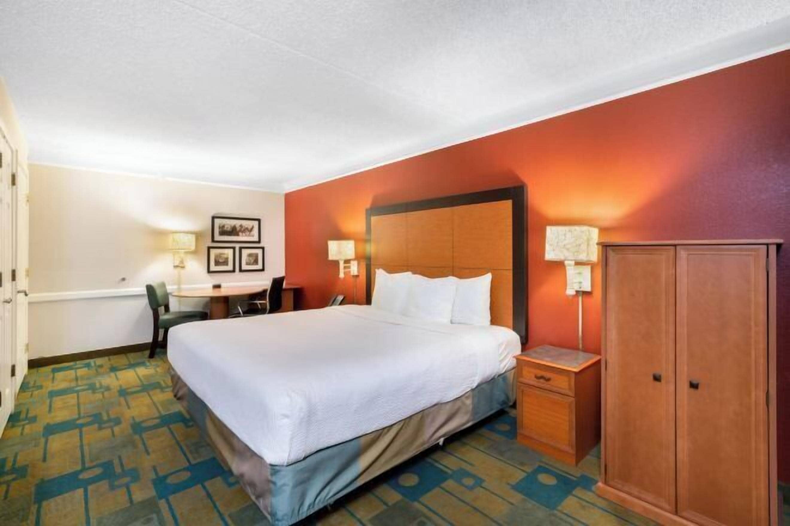 Premium bedding, desk, blackout drapes, iron/ironing board